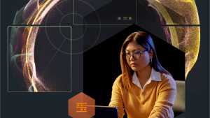 Woman on laptop with geometric graphics behind her.